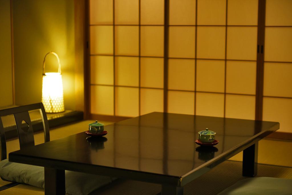 Отель Shin Kaikatei Izumi Идзу Экстерьер фото